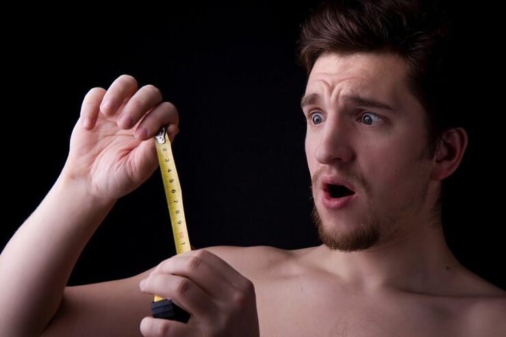 a man used a measuring tape to measure his penis before enlargement surgery